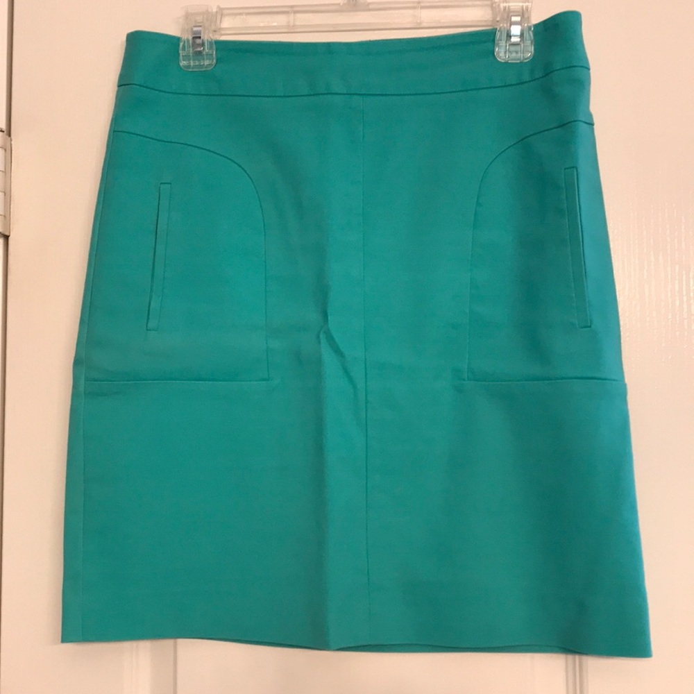 Green pencil skirt with pockets